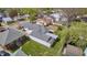 This aerial view highlights the property's roof, backyard, and overall neighborhood layout at 1641 Winton Ave, Speedway, IN 46224
