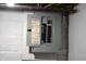 Basement electrical panel on a block wall, showing breakers and wiring at 1641 Winton Ave, Speedway, IN 46224