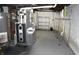 Basement with furnace, water heater, and shelving for storage at 1641 Winton Ave, Speedway, IN 46224