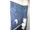 Tiled bathroom featuring a toilet and shower, perfect for a small space at 1641 Winton Ave, Speedway, IN 46224