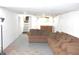 Basement space with block walls and carpet, featuring staircase to upper level at 1641 Winton Ave, Speedway, IN 46224