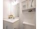 Bathroom featuring a white single sink vanity with quartz countertop and mirror at 19800 Sutton Ter, Westfield, IN 46074