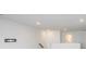 Upstairs loft featuring neutral paint, recessed lighting, and an open floor plan at 19800 Sutton Ter, Westfield, IN 46074