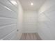 Bright walk-in closet with wire shelving for optimal storage solutions at 19800 Sutton Ter, Westfield, IN 46074