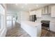 This open kitchen features a long counter top, and stainless steel appliances at 19800 Sutton Ter, Westfield, IN 46074