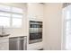 The kitchen features a built in stainless oven and microwave at 19800 Sutton Ter, Westfield, IN 46074