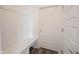 A clean and bright mudroom features built in seating and coat hooks at 19800 Sutton Ter, Westfield, IN 46074