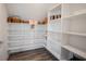 A walk-in pantry features an abundance of shelving for food and storage at 19800 Sutton Ter, Westfield, IN 46074