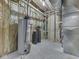Unfinished basement featuring essential utilities such as a water heater and water softener at 20 Forrests Edge Ct, Indianapolis, IN 46227