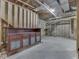 Unfinished basement with a rustic wet bar and exposed ductwork and studs, awaiting personalization at 20 Forrests Edge Ct, Indianapolis, IN 46227