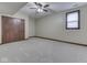 Finished basement with a ceiling fan, neutral carpeting and closet at 20 Forrests Edge Ct, Indianapolis, IN 46227