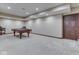 Finished basement featuring a pool table and neutral carpet, perfect for recreation and entertainment at 20 Forrests Edge Ct, Indianapolis, IN 46227