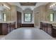 Luxurious primary bath with double vanities, a soaking tub, and a separate shower at 20 Forrests Edge Ct, Indianapolis, IN 46227