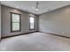 Bedroom featuring carpet flooring, and gray walls, illuminated by a ceiling fan and natural light at 20 Forrests Edge Ct, Indianapolis, IN 46227