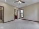 Neutral bedroom with large windows, neutral carpet and ensuite bathroom at 20 Forrests Edge Ct, Indianapolis, IN 46227