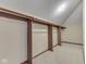 Walk-in closet with custom shelving and carpeted floor at 20 Forrests Edge Ct, Indianapolis, IN 46227