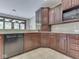 Kitchen features granite countertops, tiled backsplash, and stainless appliances at 20 Forrests Edge Ct, Indianapolis, IN 46227