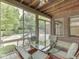 Sunroom featuring views of the pool, wood ceiling and table with four chairs at 20 Forrests Edge Ct, Indianapolis, IN 46227