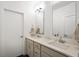 Modern bathroom featuring double sinks, quartz countertops, and sleek hardware at 2125 Coretta Way, Indianapolis, IN 46202
