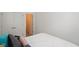 Relaxing bedroom featuring a comfortable bed, natural light, and ample closet space at 2125 Coretta Way, Indianapolis, IN 46202