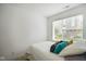 Bright bedroom with natural light, plush bedding, and neutral decor at 2125 Coretta Way, Indianapolis, IN 46202