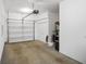 Spacious garage with ample storage space and an automatic door opener at 2125 Coretta Way, Indianapolis, IN 46202