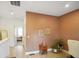 Hallway that leads to a bedroom, featuring light wood floors and light brown wall at 2125 Coretta Way, Indianapolis, IN 46202