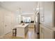 Bright kitchen features a center island, stainless appliances, and ample cabinet space at 2125 Coretta Way, Indianapolis, IN 46202