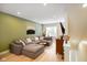 Spacious living room features a comfortable sectional couch, modern decor, and abundant natural light at 2125 Coretta Way, Indianapolis, IN 46202