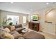 Cozy living room features comfortable seating, stylish decor, and abundant natural light at 2125 Coretta Way, Indianapolis, IN 46202