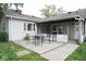 Backyard patio area features a table and chairs at 254 Bittersweet Dr, Whiteland, IN 46184