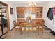 Dining room features an oval table, seating for six, and built-in cabinetry at 254 Bittersweet Dr, Whiteland, IN 46184