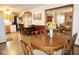 The dining room leads to the kitchen and the living room at 254 Bittersweet Dr, Whiteland, IN 46184