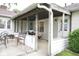 Covered patio area with table, chairs and grill at 254 Bittersweet Dr, Whiteland, IN 46184