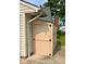 An outdoor storage shed with neutral color complements the home's exterior, useful for storage at 254 Bittersweet Dr, Whiteland, IN 46184