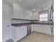 Spacious kitchen featuring white cabinetry, durable countertops, and stainless steel dishwasher at 2756 Branigin Creek Blvd, Franklin, IN 46131