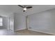 Spacious living room with a ceiling fan, light gray walls, and modern flooring at 2756 Branigin Creek Blvd, Franklin, IN 46131