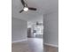 Bright, open-concept living space with modern flooring and sightlines to the kitchen at 2756 Branigin Creek Blvd, Franklin, IN 46131