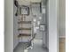 Utility closet featuring a water heater, a furnace and shelving for storage at 2756 Branigin Creek Blvd, Franklin, IN 46131