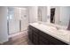 Spacious bathroom featuring dual sinks, modern vanity, and a glass-enclosed shower at 2916 W Bargello Ln, Monrovia, IN 46157