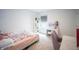 Bedroom featuring a cozy bed, desk area, and window at 2916 W Bargello Ln, Monrovia, IN 46157