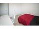 Clean bedroom with a bed, carpet, desk, and two doors in the corner at 2916 W Bargello Ln, Monrovia, IN 46157