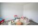 Bright and spacious Bedroom with soft carpeting, -sized chairs and lots of soft plush toys at 2916 W Bargello Ln, Monrovia, IN 46157