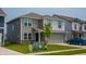 Attractive two-story home with gray siding, a two-car garage, and a lush green lawn at 2916 W Bargello Ln, Monrovia, IN 46157