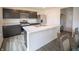 Well-designed kitchen with stainless steel appliances, dark cabinets, and a center island for entertaining at 2916 W Bargello Ln, Monrovia, IN 46157