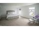 Spacious main bedroom featuring lots of natural light and a relaxing seating area at 2916 W Bargello Ln, Monrovia, IN 46157
