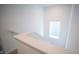 Staircase with white railing, window with blinds, and light walls at 2916 W Bargello Ln, Monrovia, IN 46157