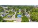 Wide aerial shot displays the home's location within a quiet, tree-lined neighborhood at 300 N Church St, Arcadia, IN 46030