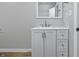Bathroom vanity with a sleek mirror and modern hardware at 300 N Church St, Arcadia, IN 46030