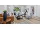 Inviting living room featuring neutral tones and natural light, perfect for relaxation and entertainment at 300 N Church St, Arcadia, IN 46030